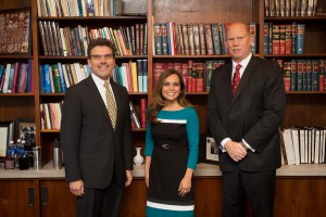 Exceptional Service Award recipient Jennifer Sandoval-Dancs with President Hiram Chodosh and Vice President for Advancement and External Affairs Ernie Iseminger.