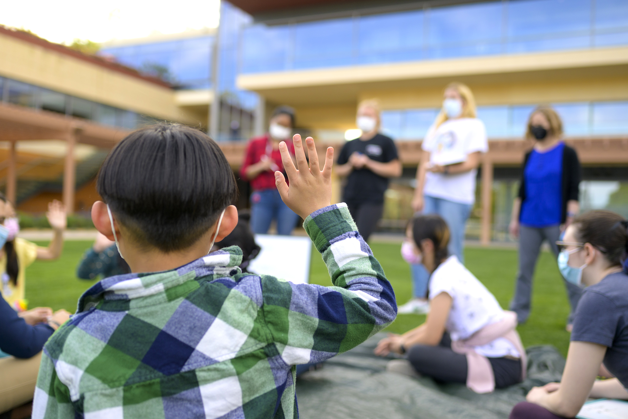 Participants at the Autism Clinic get together for a group activity on Gann Quadrangle.