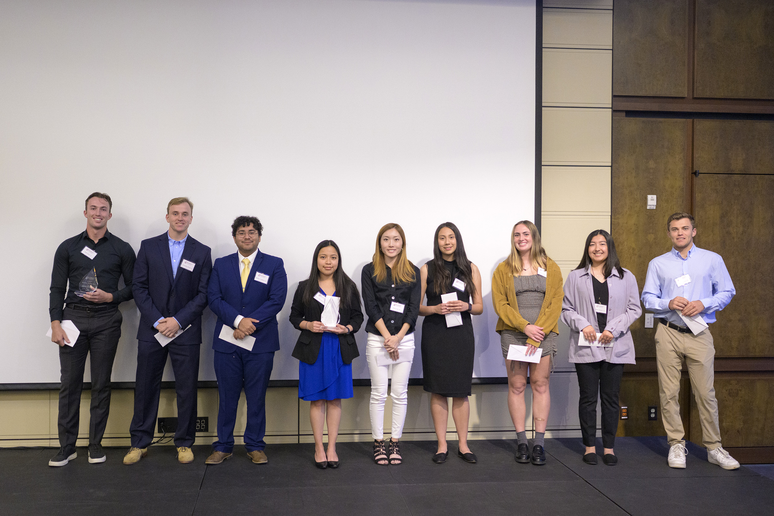 Matthew Landeros ’23 accepting award.