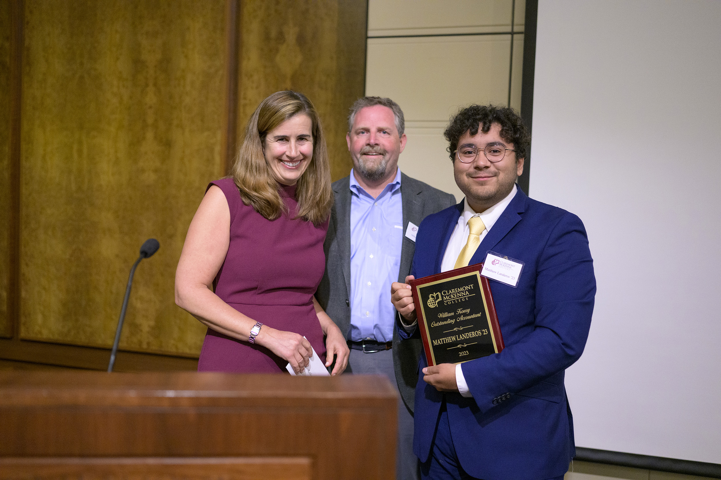 Matthew Landeros ’23 accepting award.