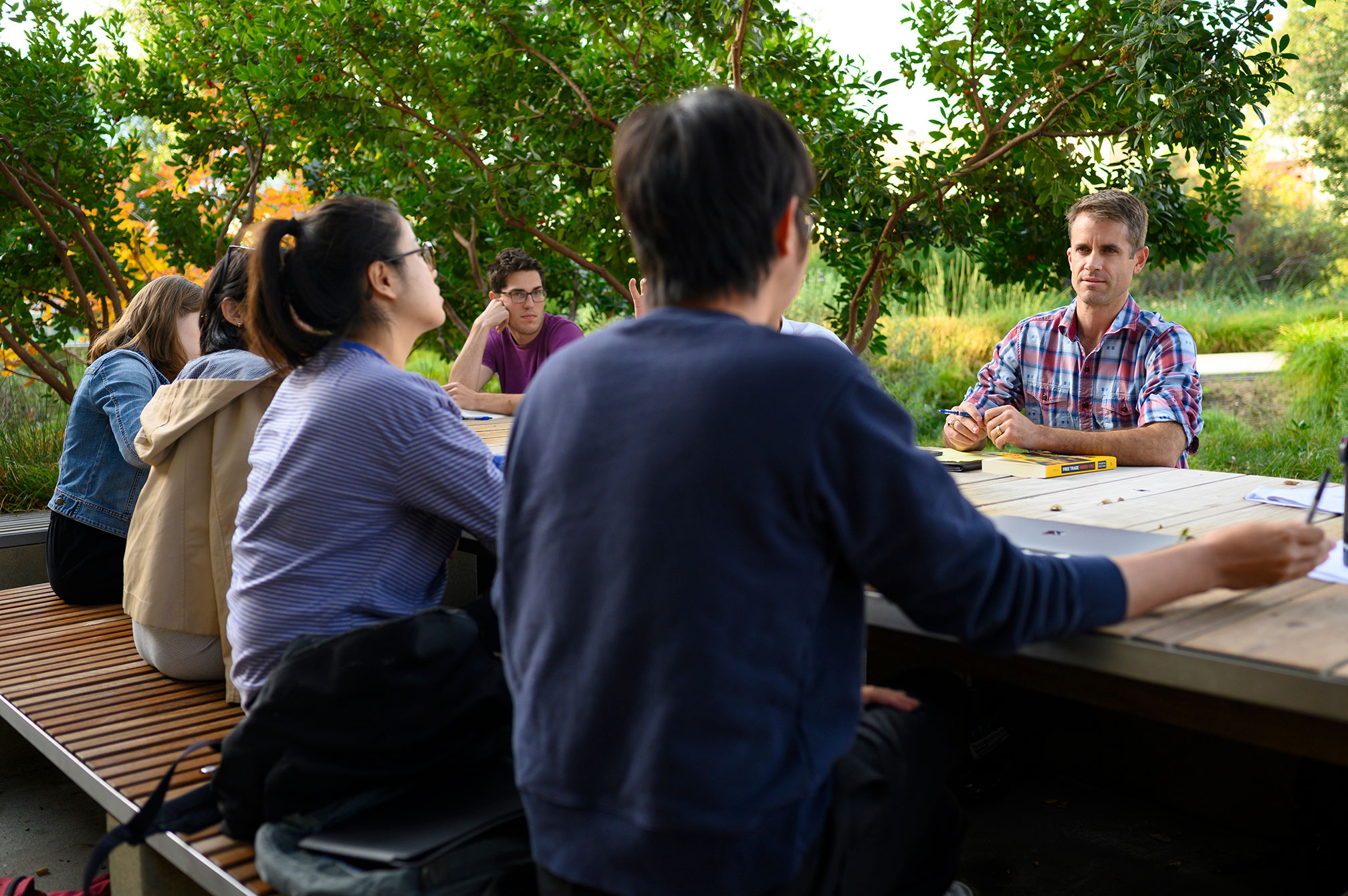 Professor and Lowe Institute director Cameron Shelton with students.