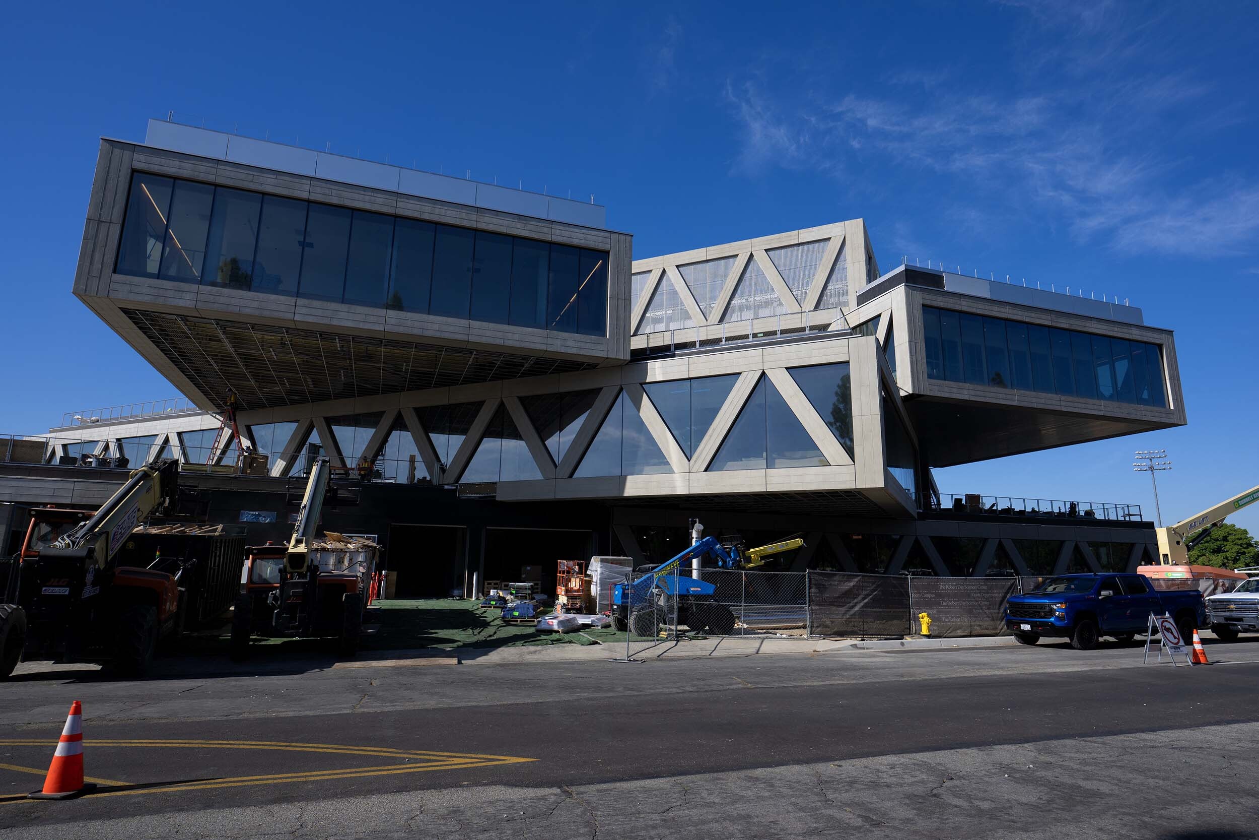 Upward view of the Robert Day Sciences Center from the front walkway.
