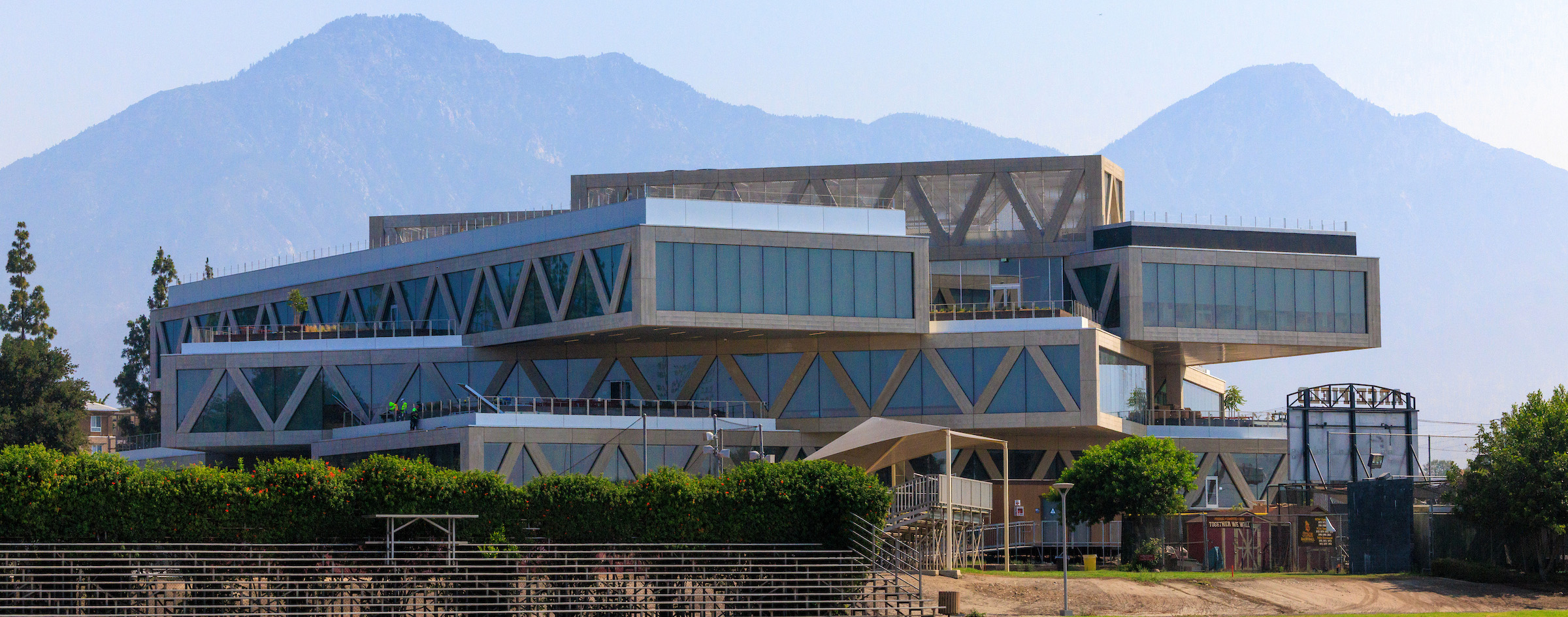 Exterior of the Robert Day Sciences Center across Zind Field