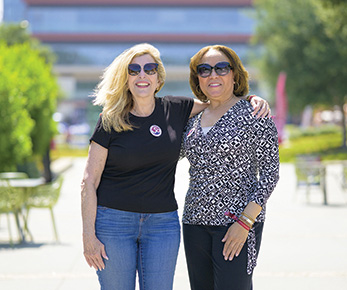 Mari Adams ’80 and Lorraine Bains ’88.