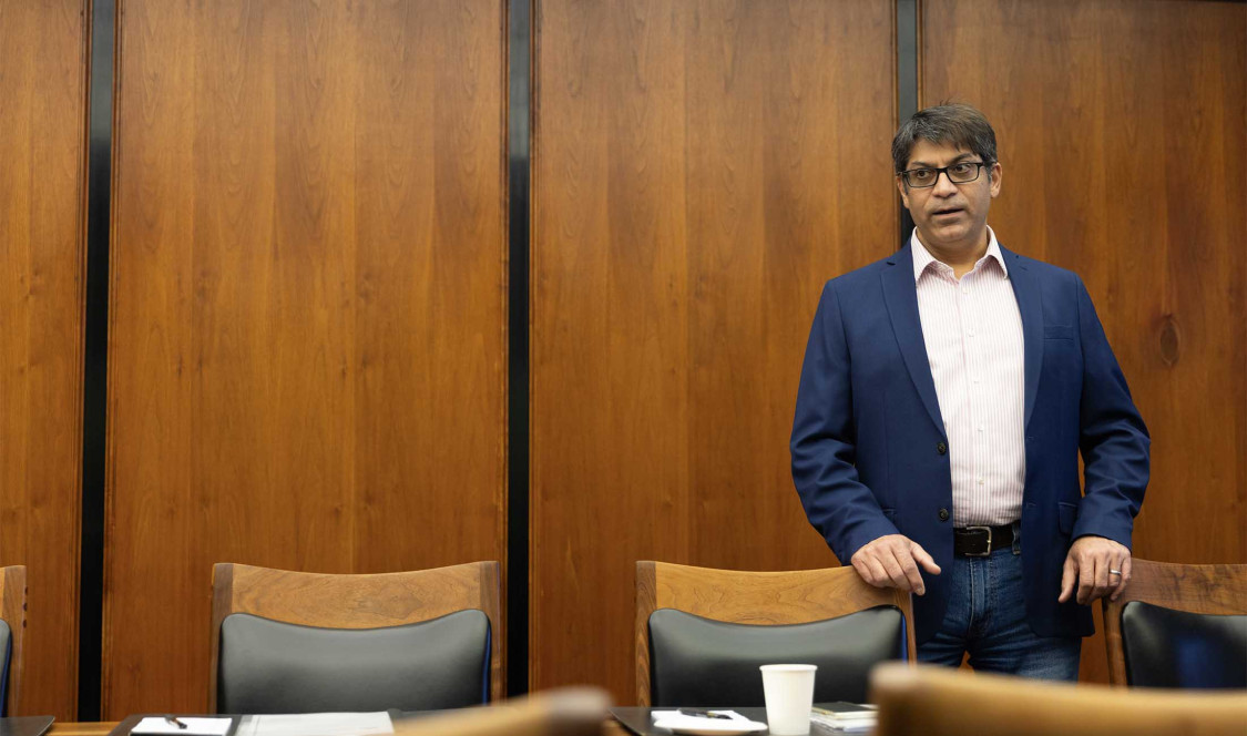 Prof. Nishant Dass in classroom.