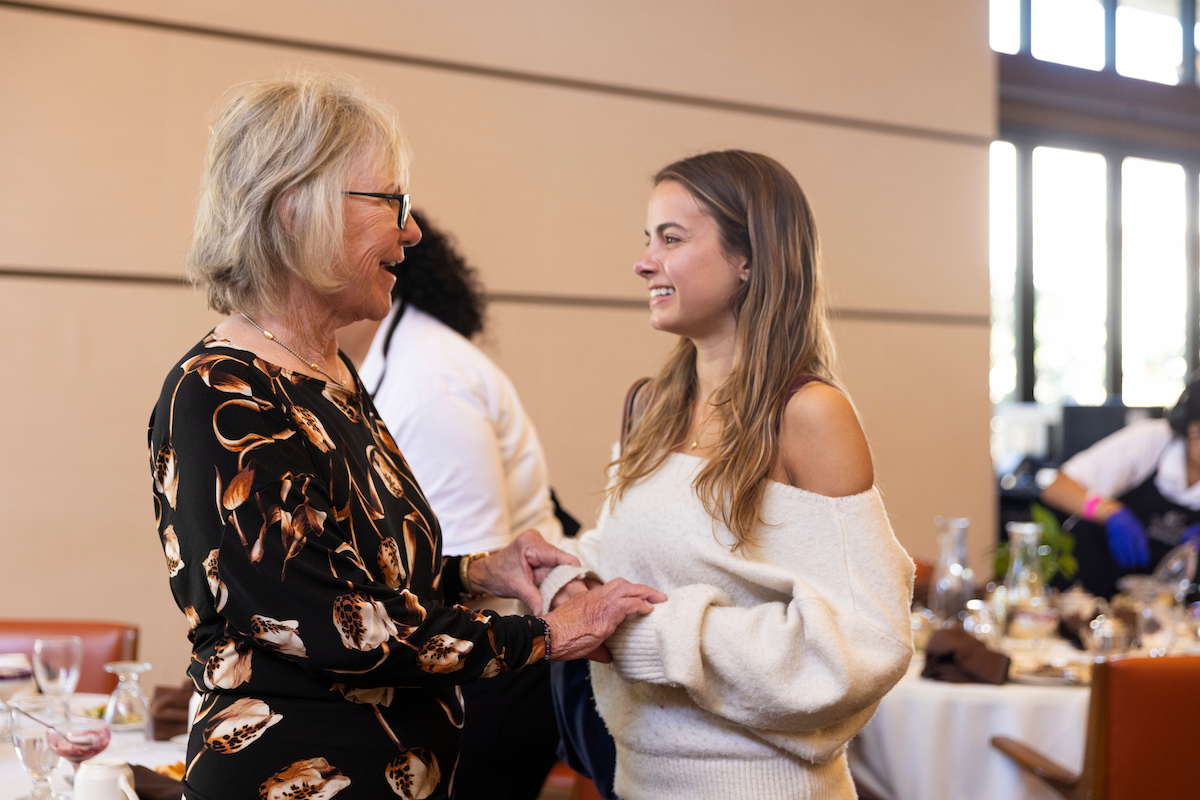 Dr. Marilou Ryder spends time with a student after WLA's 2026 workshop.