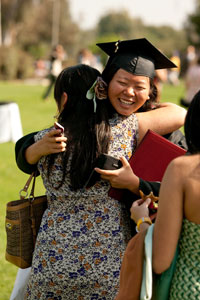 recent graduate embracing her mother