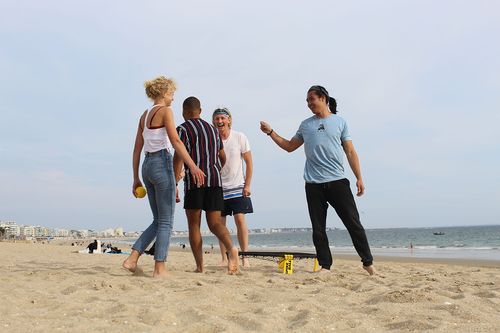 Kiubon Kokko on the beach in Nantes with friends from study abroad