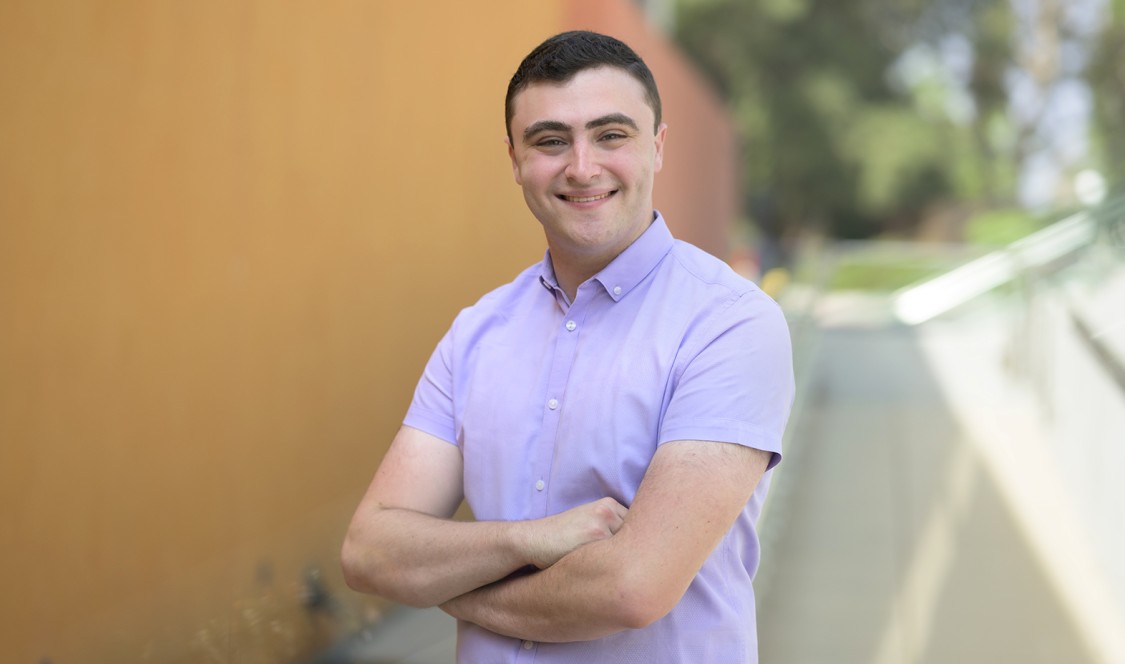 Samuel Bogen ’23 photographed outdoors near the Kravis Center on campus.