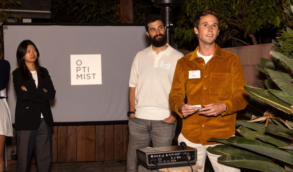 Zach Ingrasci and Chris Temple speaking at Optimist event