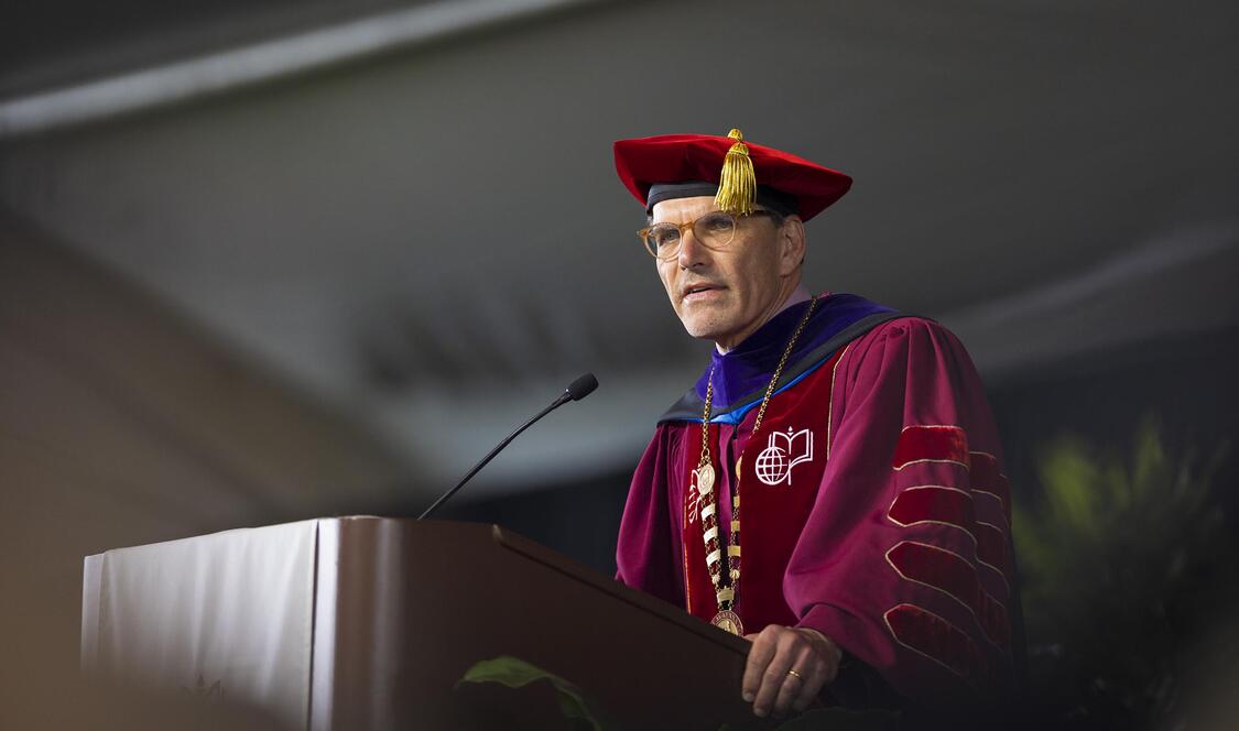 President Chodosh addressing the 2026 graduates at Commencement.