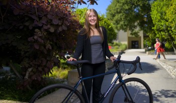 Josephine Aspromonte standing with bike