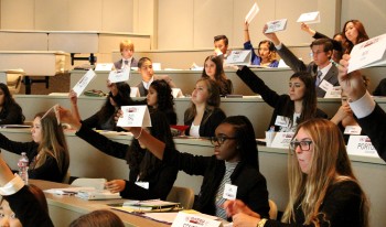 High school student delegates take part in the McKennaMUN Conference.