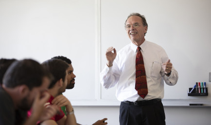 Professor Pitney addresses his class with a smile