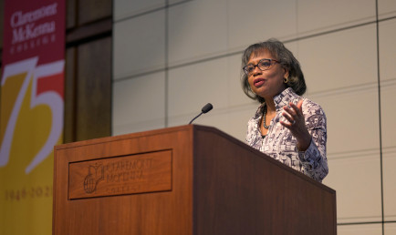 Anita Hill gives her Ath talk at the podium.