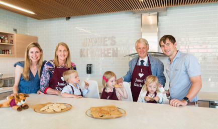 Ken Valach ’82 and his family in Janie's Kitchen.