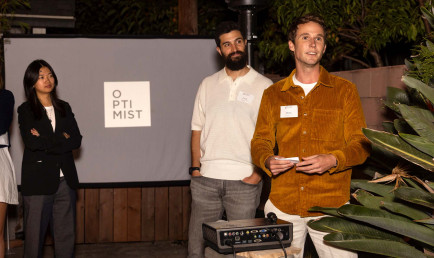 Zach Ingrasci and Chris Temple speaking at Optimist event