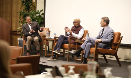 Vernon Grigg, Rajiv Vinnakota, and Hiram Chodash in discussion at the Ath