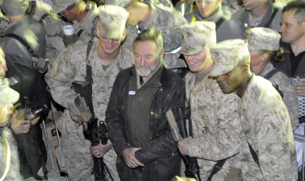 Robin Williams with U.S. Marines at a USO show in Afghanistan, December, 2010. Williams embraced the CMC ethos of service by giving his time, energy and talents to the troops. 