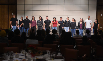 Students on stage for the International