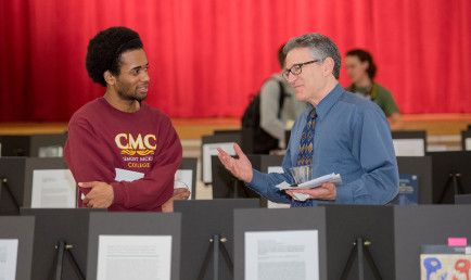Student and professor discuss research