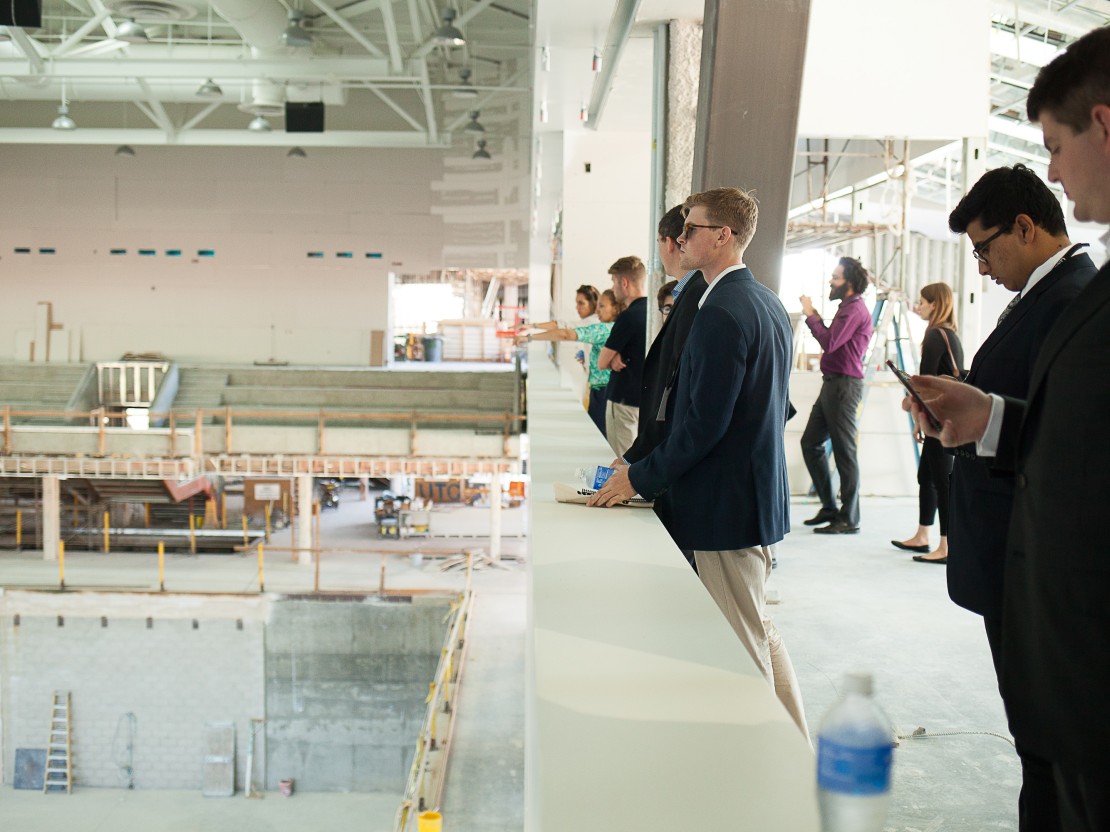 HEART OF THE PAVILION: Alumni view the Roberts Pavilion's central court.