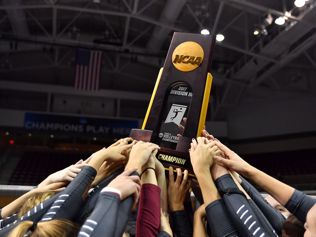 Athenas raise NCAA championship trophy