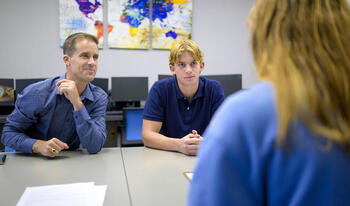 Prof. Cameron Shelton and student.