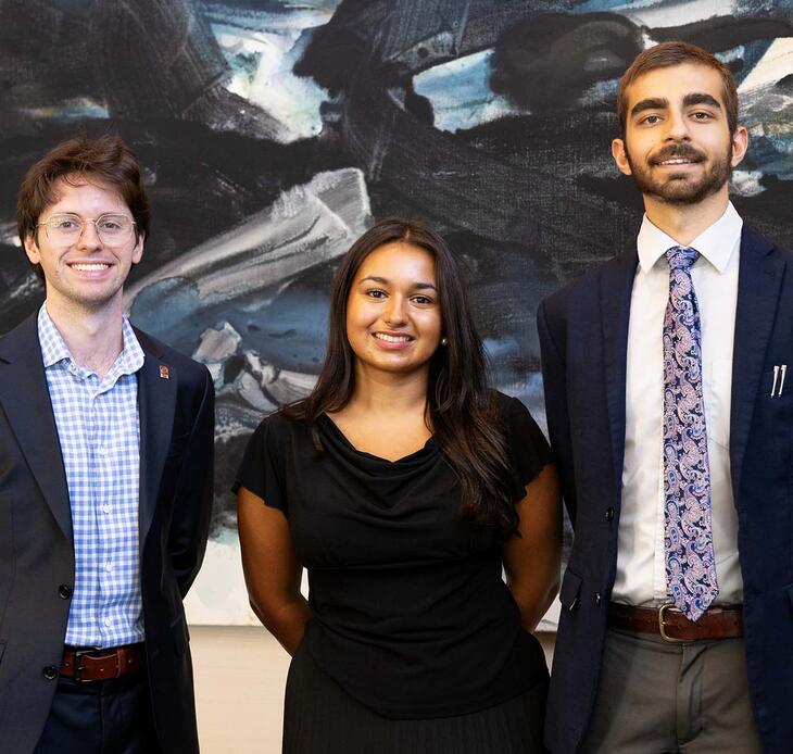 2026-27 Ath Fellows: Jasper Langley-Hawthorne ’27, Ambika (Bika) Gupta ’27, and Shivom Parihar ’28 standing in the Ath
