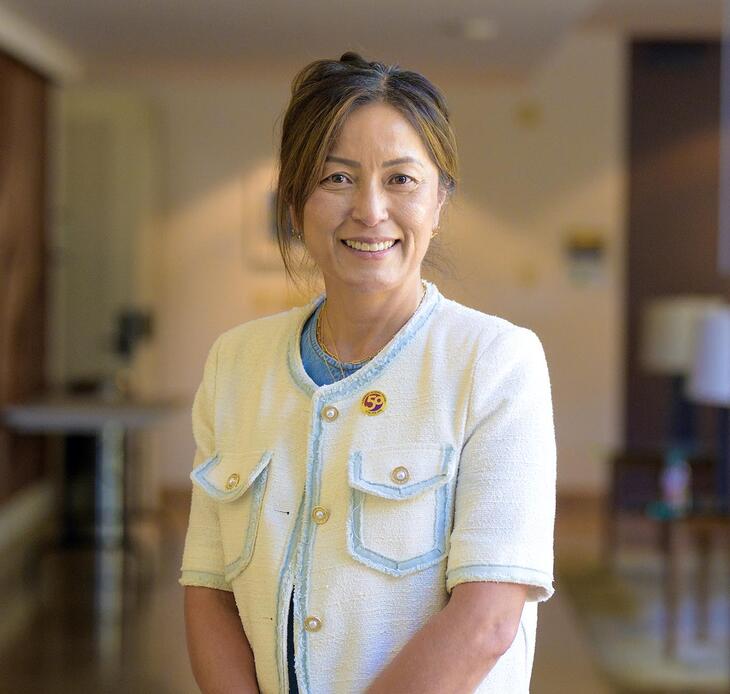 Stella Ho '97 in the Ath lobby