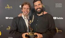 Chris Temple '12 and Zach Ingrasci '12 hold Sports Emmy